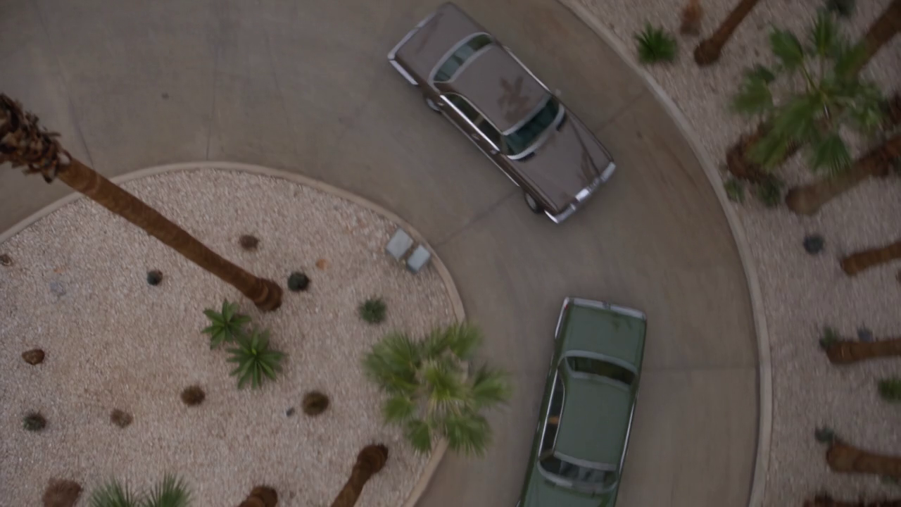 Overhead production frame showing the geography of the two-car pursuit